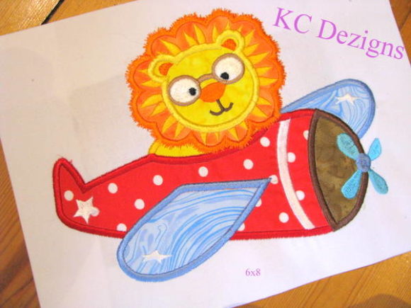 Safari Pilot Lion Applique – A Bold and Cute Embroidery Design for Craft Fairs